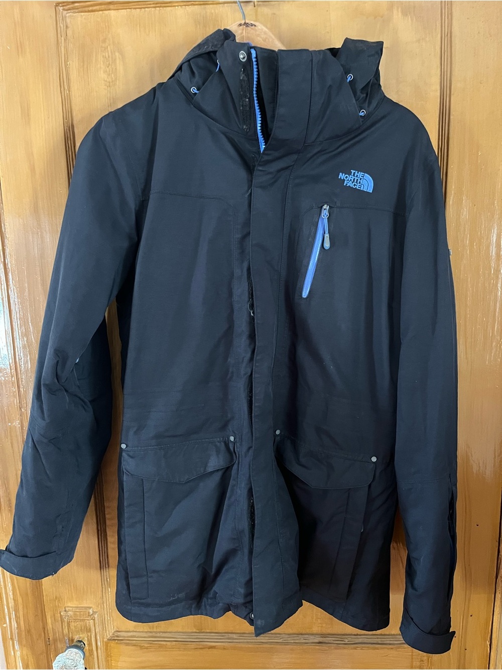 The North Face Women’s Black Hooded Waterproof Jacket with Blue Trim